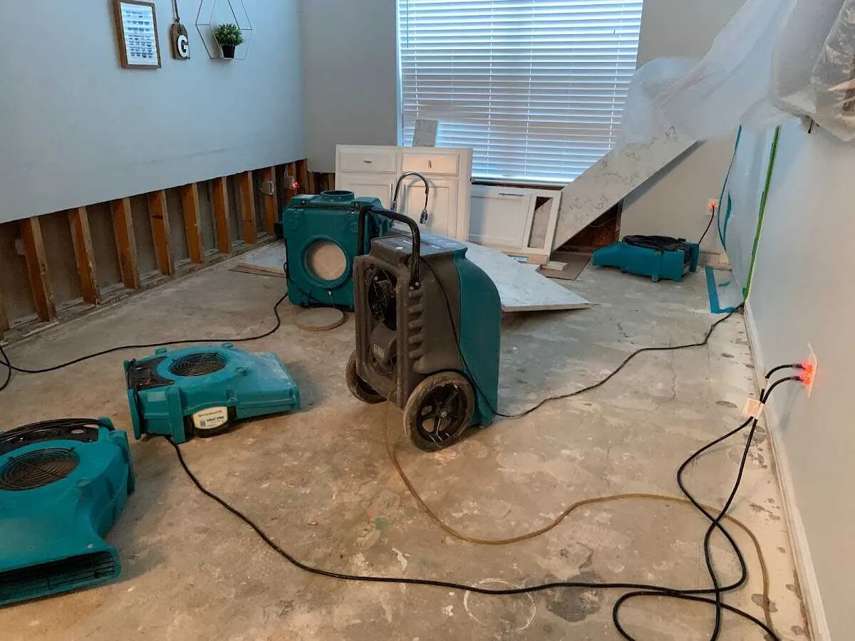 Dehumidifier in flood-cut room for Water Damage Restoration in Leeds